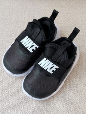 Nike Kids Black with White Logo Slip-On Sneakers